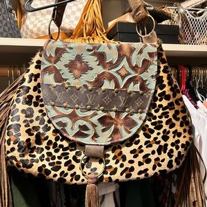 Stunning Leather and Cowhide Bag with LV trim
